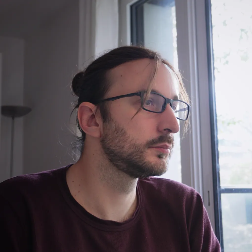 Jean-Paul looking at his computer screen